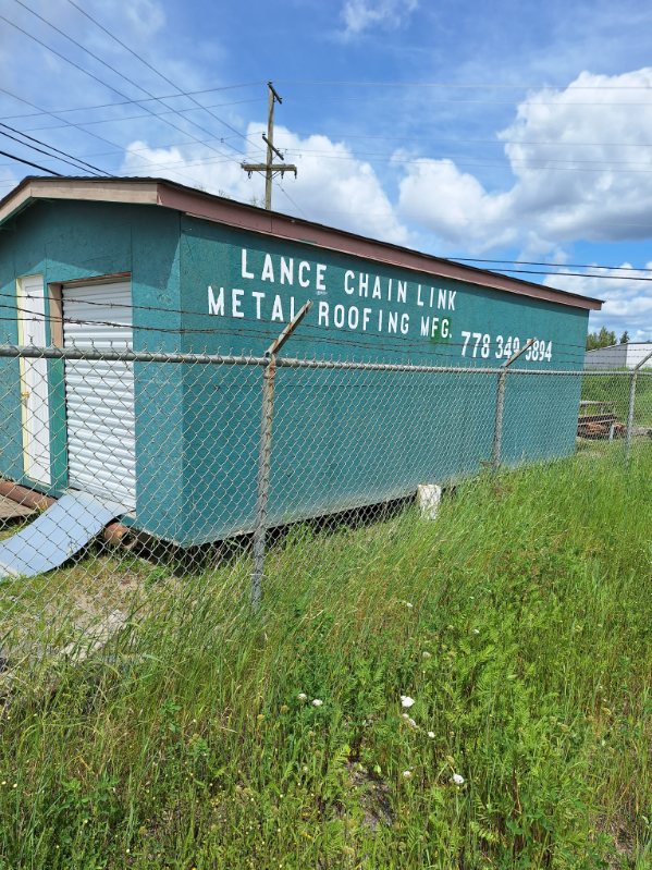 A picture showing Lance Chainlink's building on a sunny day.